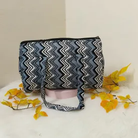 Barrel Handbags Grey With Black Zig Zag Design.