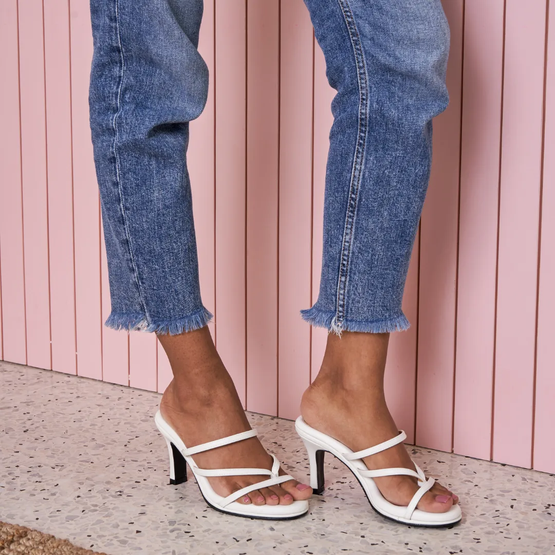 Confident in White High Heels